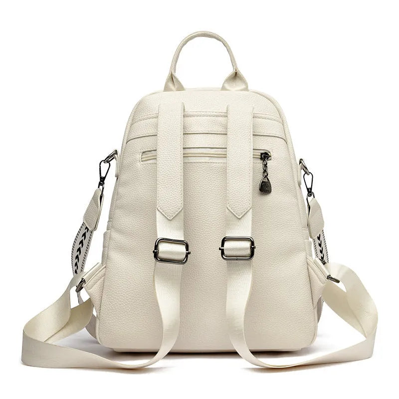 Genuine leather geometric patchwork student backpack with metal belt decoration, waterproof and wear-resistant, in black beige and yellow