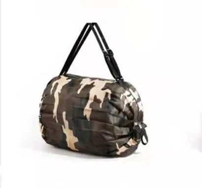 Foldable large-capacity shopping bag in 210d Oxford cloth with pink camouflage colour, hanging on a wall hook