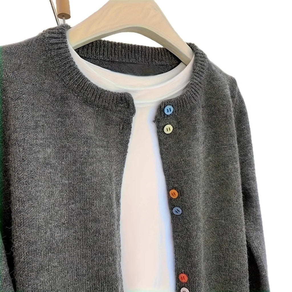 Dark grey solid colour women's polyester cardigan sweater with button front and long sleeves.
