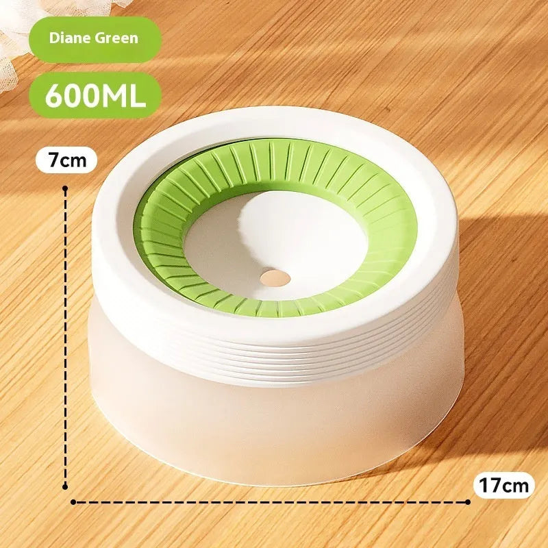 Green raised suspension water bowl for a dog on a white plate