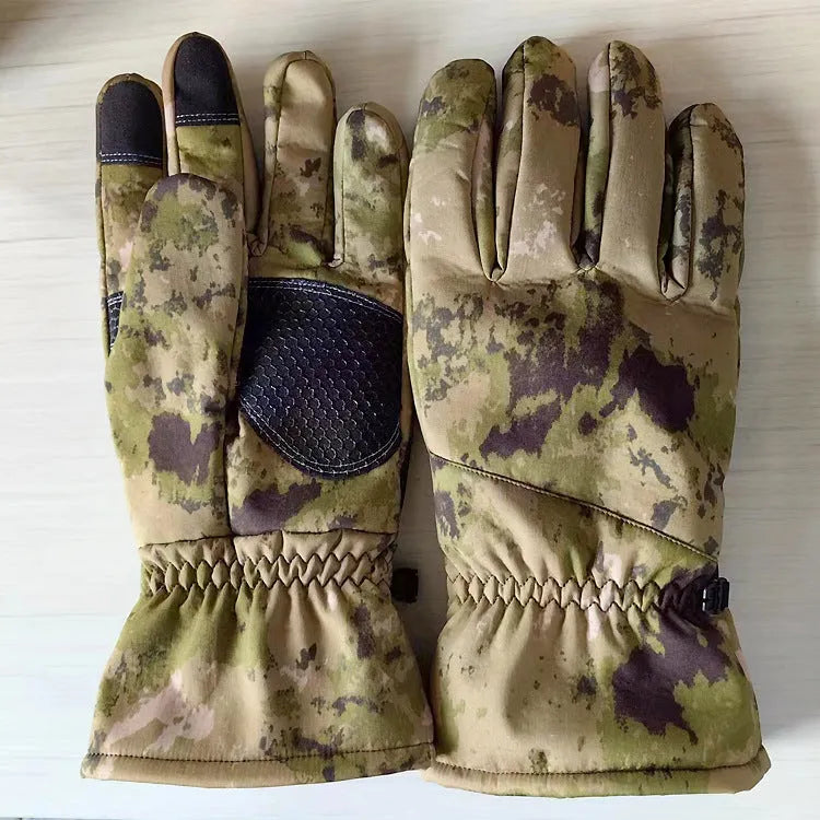Army Green tactical ski glove with touch screen fingertips on a snowy background.
