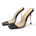 Women's black and silver high heel boots with PVC soles displayed in multiple sizes