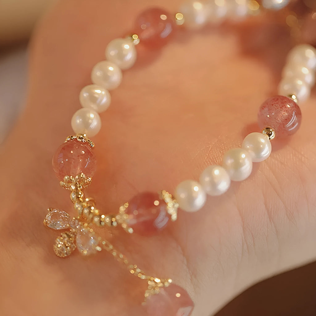 Strawberry quartz crystal bracelet with stringed pearls and bow charm in INS style