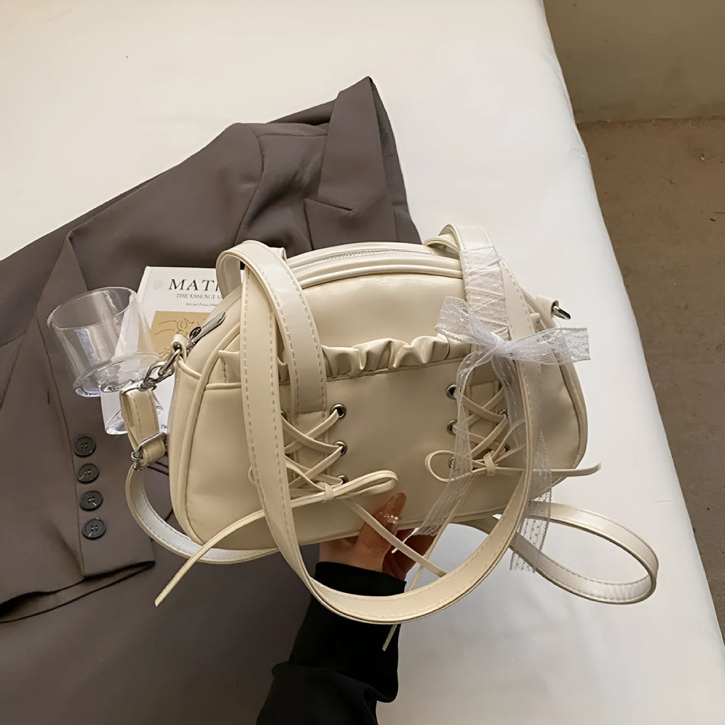Women's casual PU shoulder handbag with a bandage bow and internal phone pocket in beige, black, blue, or pink.