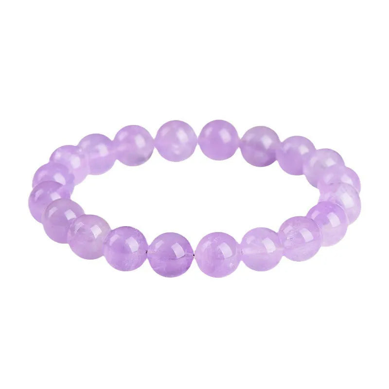Lavender amethyst round bead bracelet with water ripple geometric pattern showing light purple crystal beads