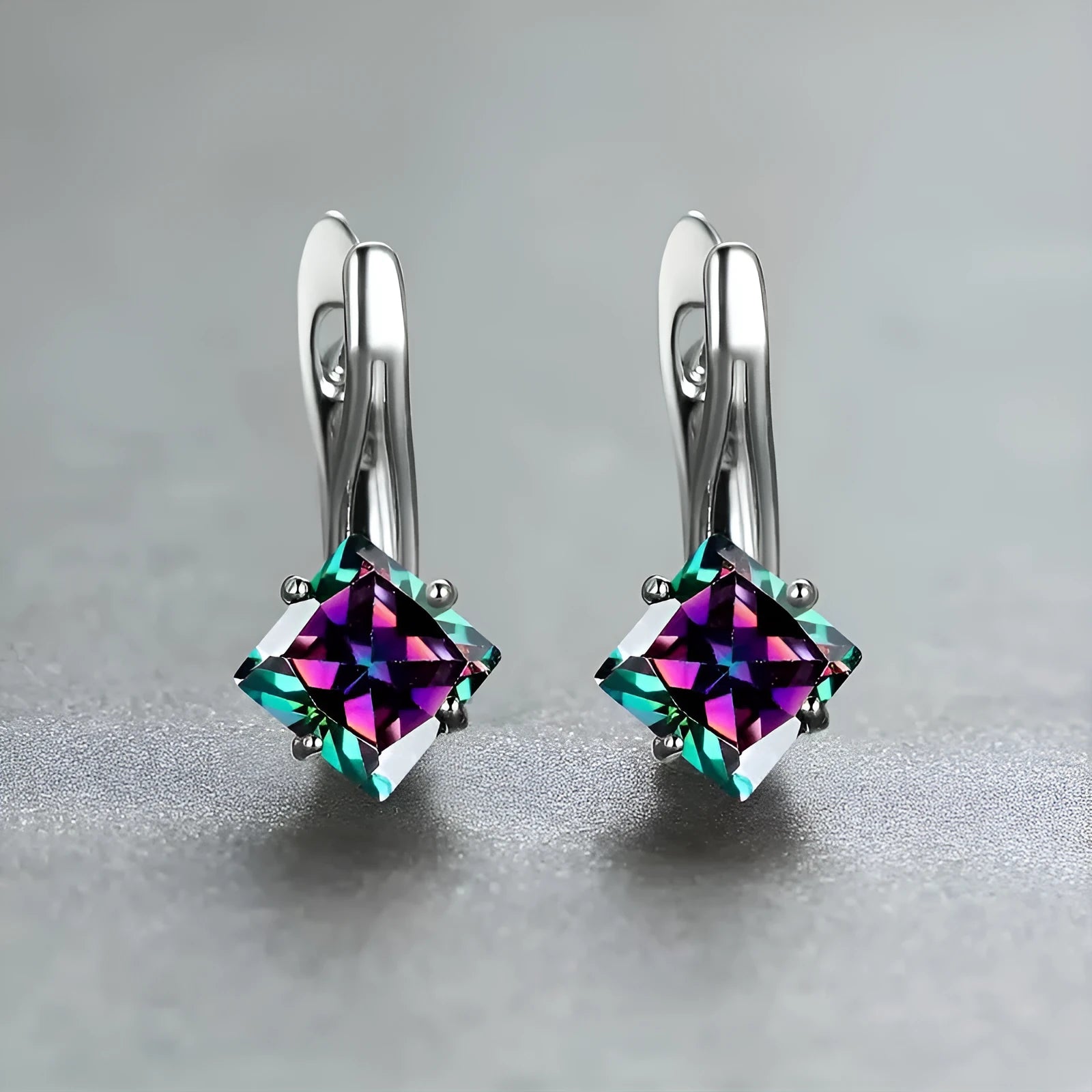 Women's copper earrings with diamond design and inlaid blue zircon stones