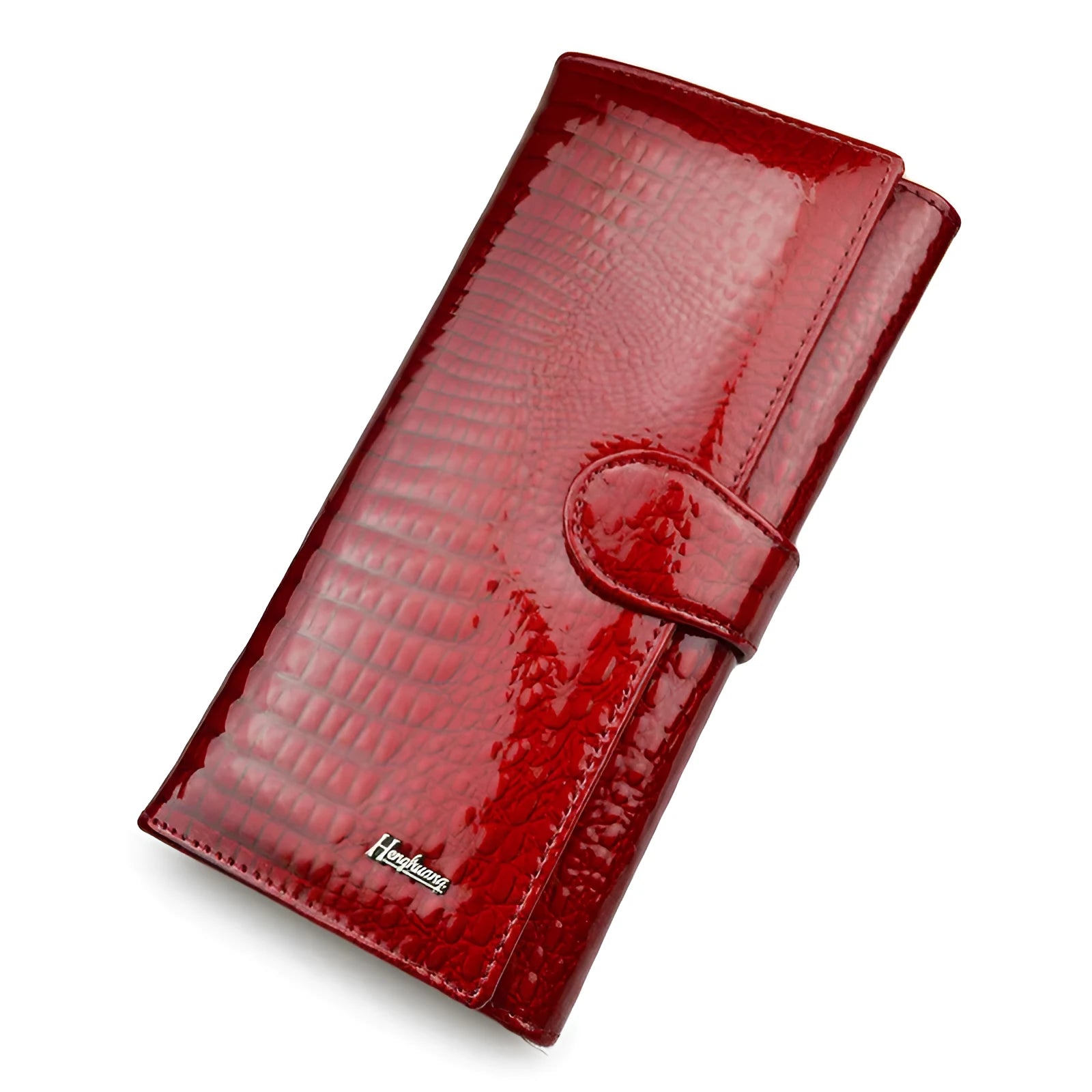 Women's red patent leather coin purse with embossed crocodile pattern texture.