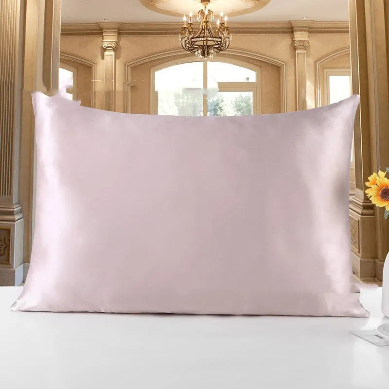 Double-sided silk pillowcase in apricot colour showing smooth satin weave texture.