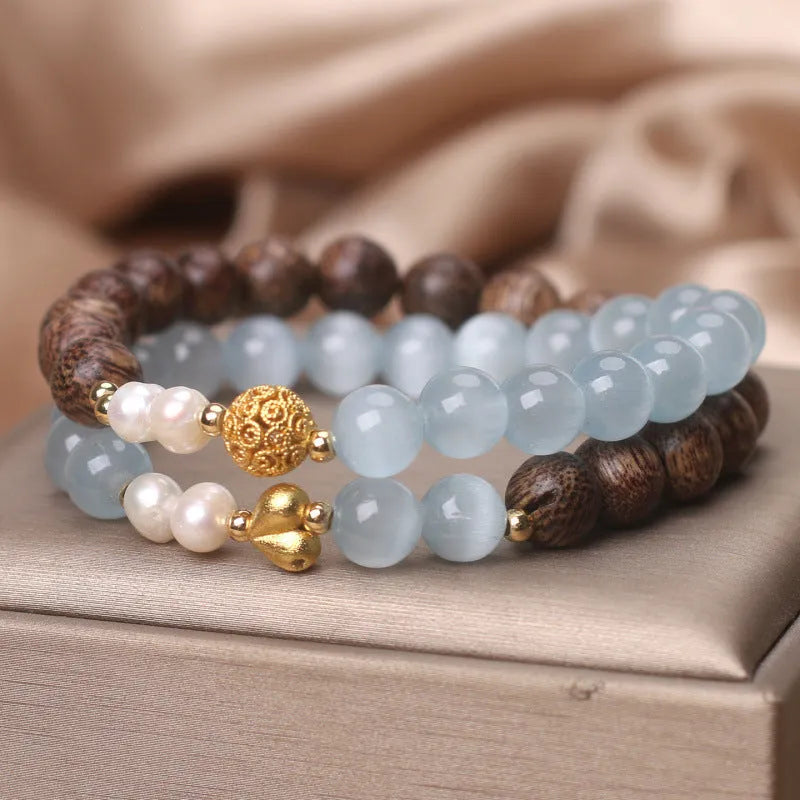 Natural agarwood opal double ring bracelet with light blue crystal lotus seedpod centrepiece, women's ethnic style