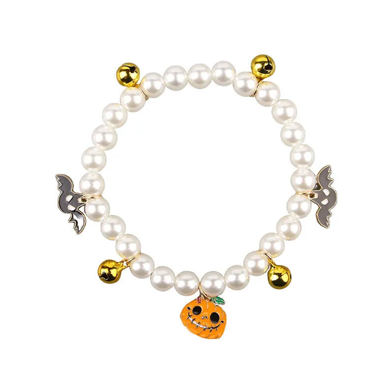 Halloween pearl necklace pet collar with pumpkin designs in purple ghost, skull, and smiling variations