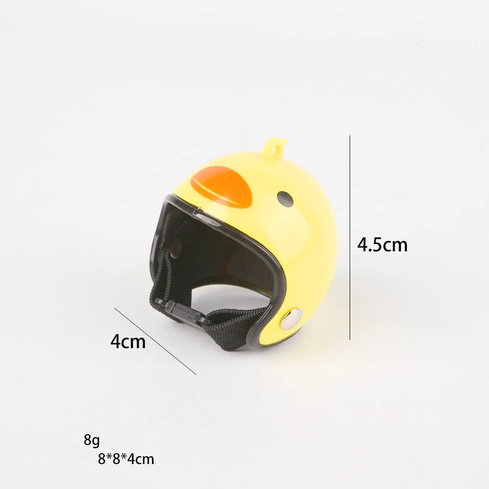 Small adjustable plastic safety helmet for a chicken or bird, shown in a fun design.