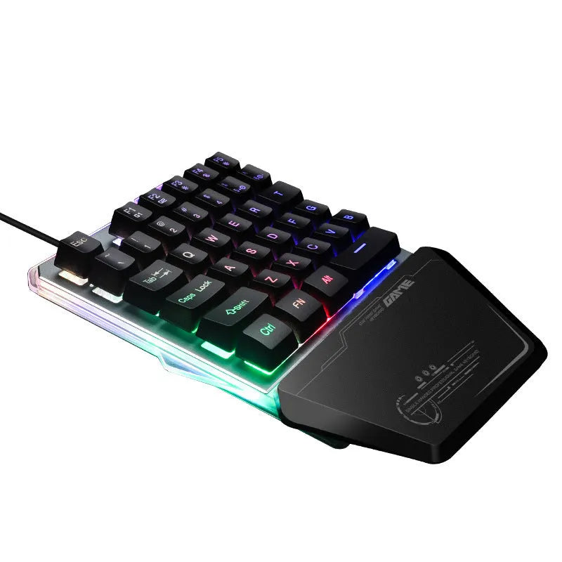 Black robotic one-handed mechanical keyboard with RGB backlit keys on a G40 flow colour plate.