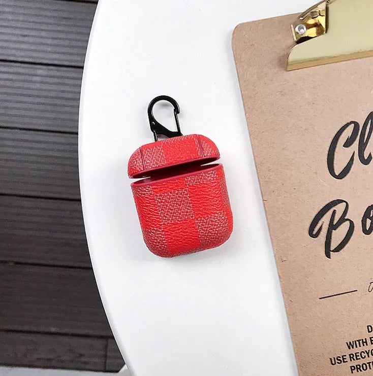 iPhone XS Max hard shell plastic case with grid pattern and integrated hook for Apple AirPods 2nd gen case.