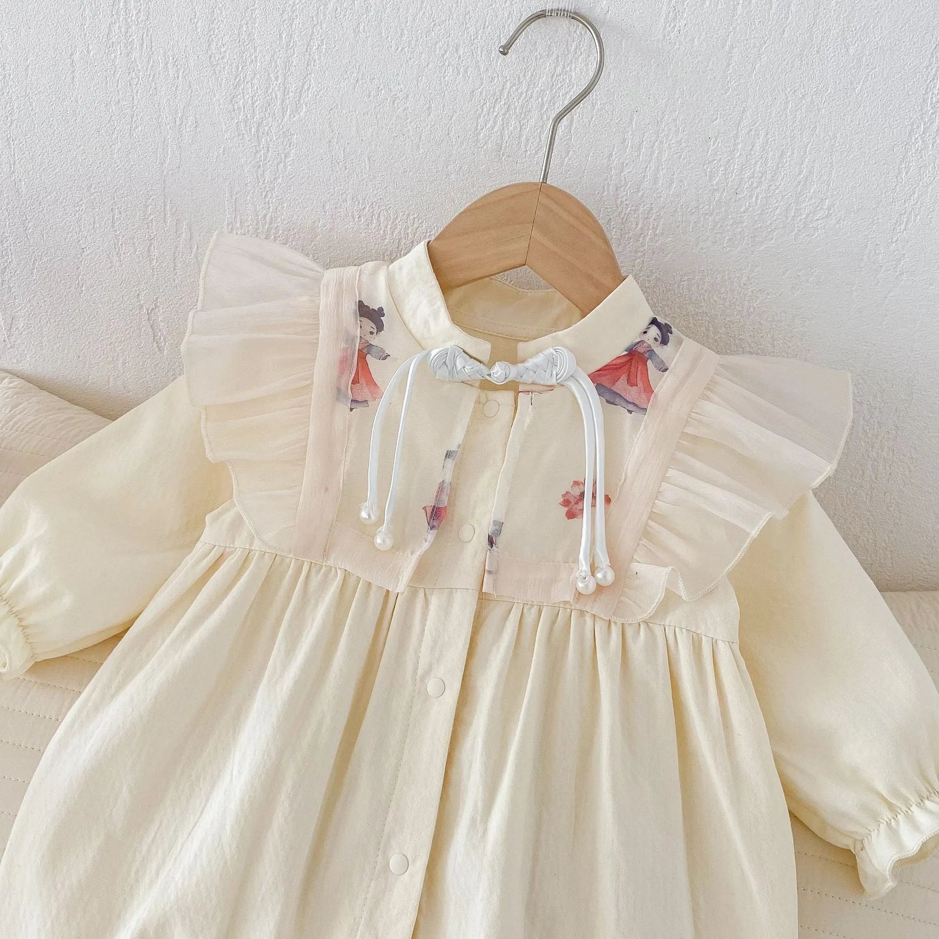 Baby cotton jumpsuit in apricot colour, long climbing style with pullover closure, suitable for heights 66cm to 100cm