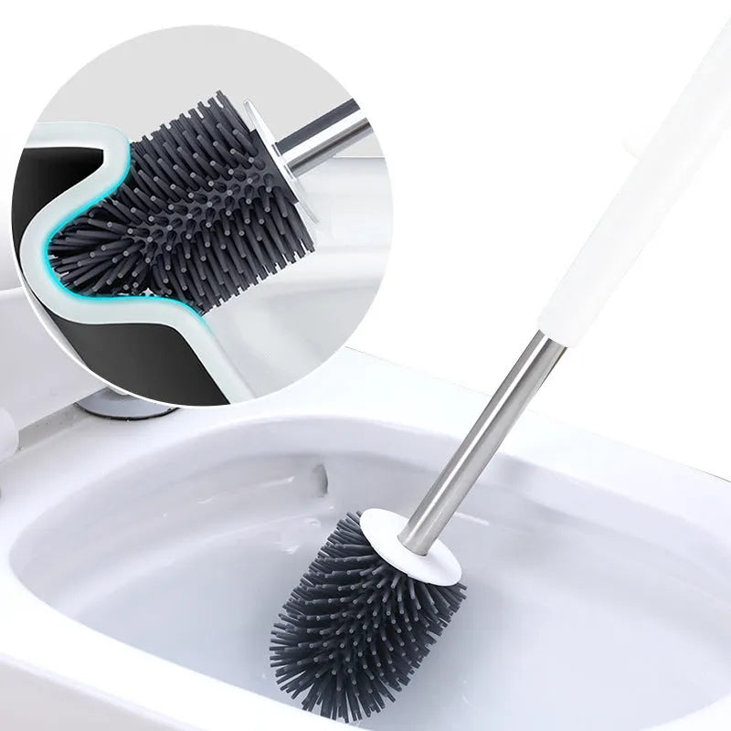 Portable toilet brush with soft silicone bristles and wall-mounted holder for bathroom cleaning