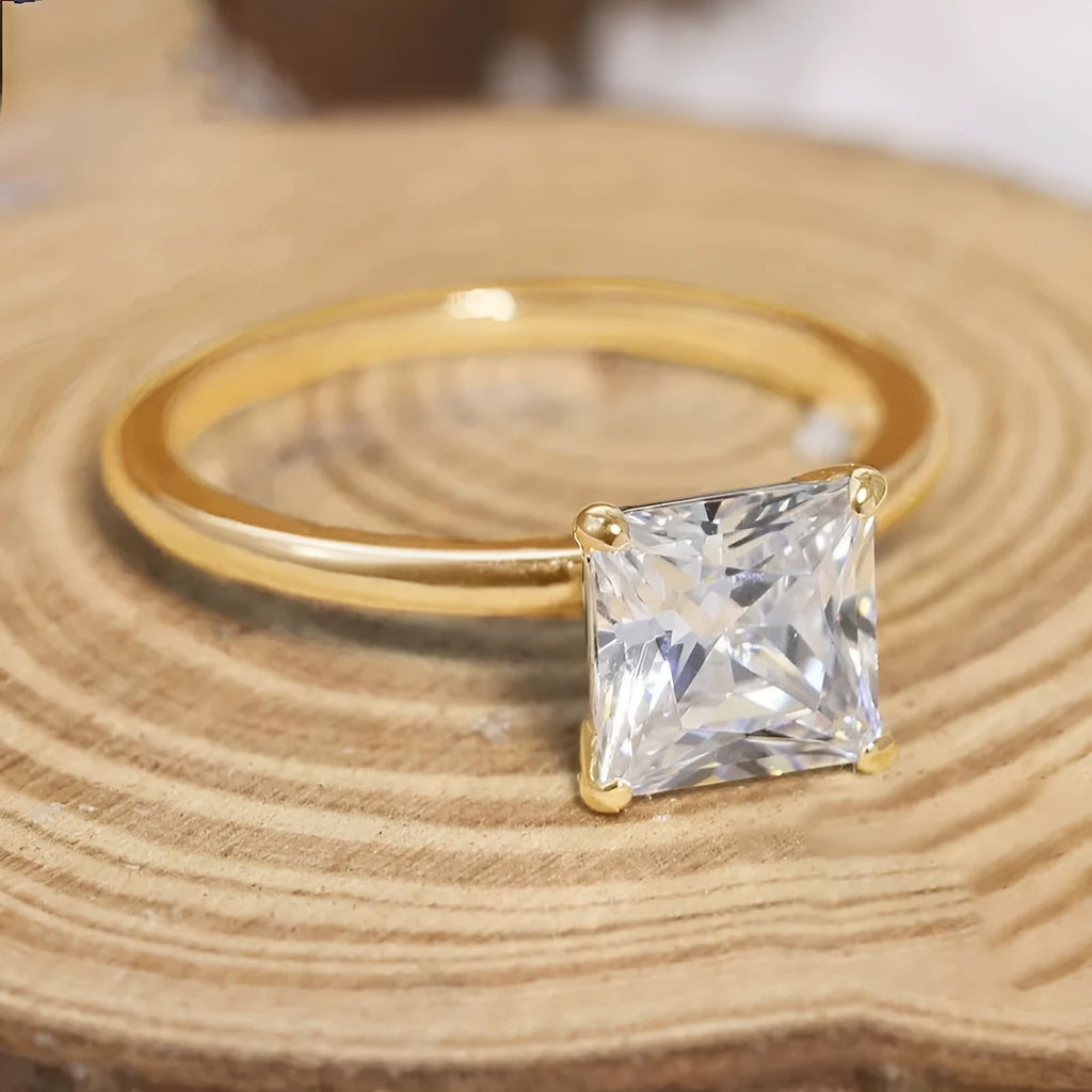 A simple geometric 925 sterling silver ring for women, shown in silver, gold, and rose gold colour options on a grey background.