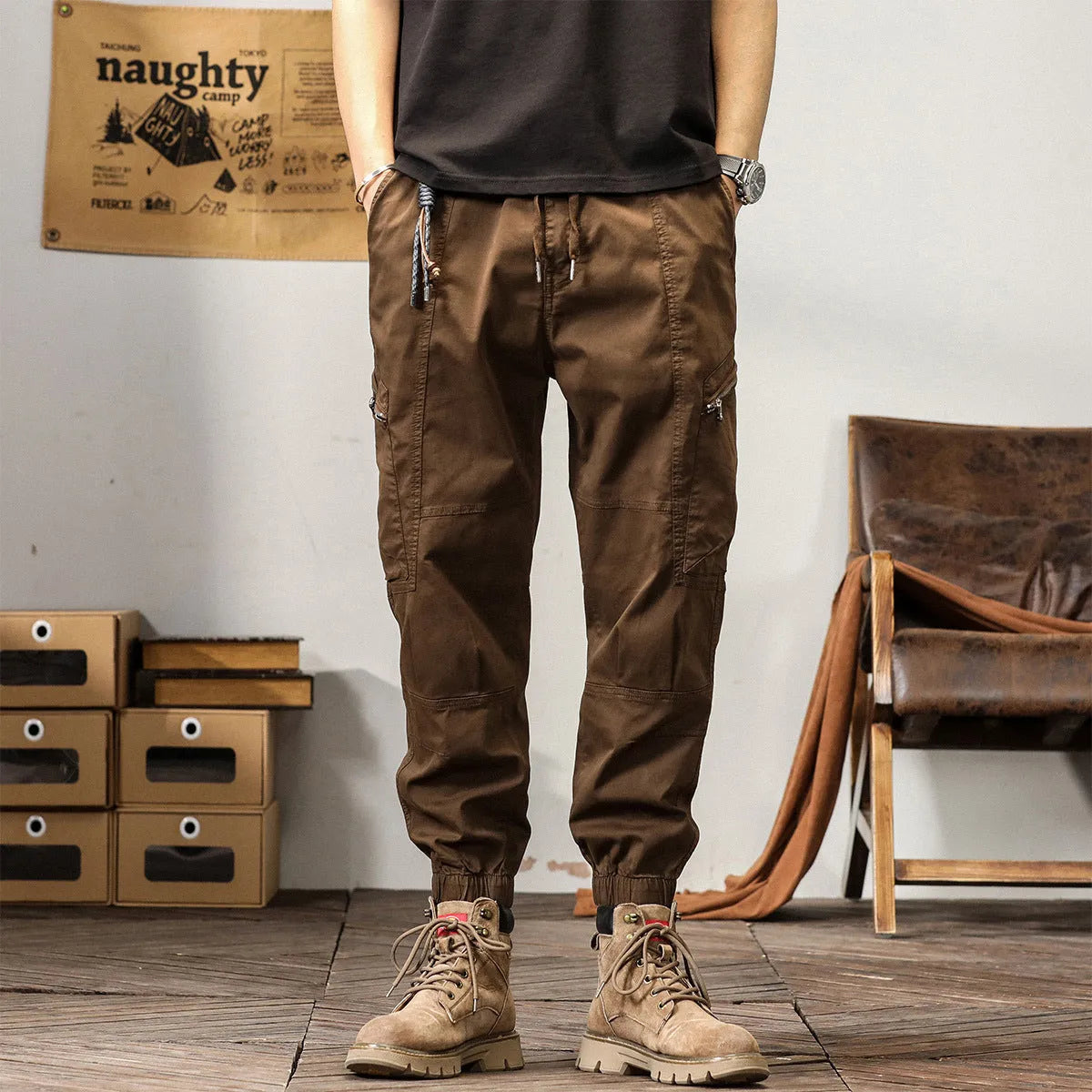 Men's Korean style tapered harem pants in cotton with small leg opening and mid-waist design
