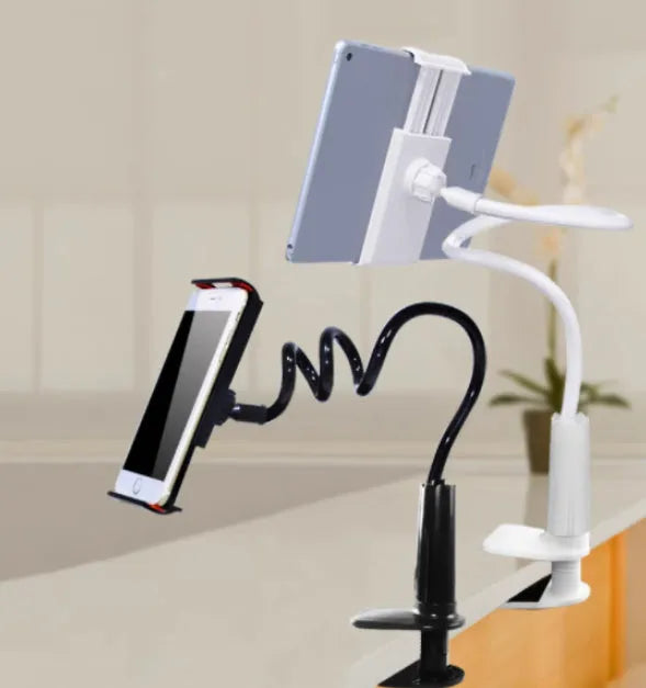 Blue universal mobile phone holder with 120cm pole clamped to bedside table holding a tablet