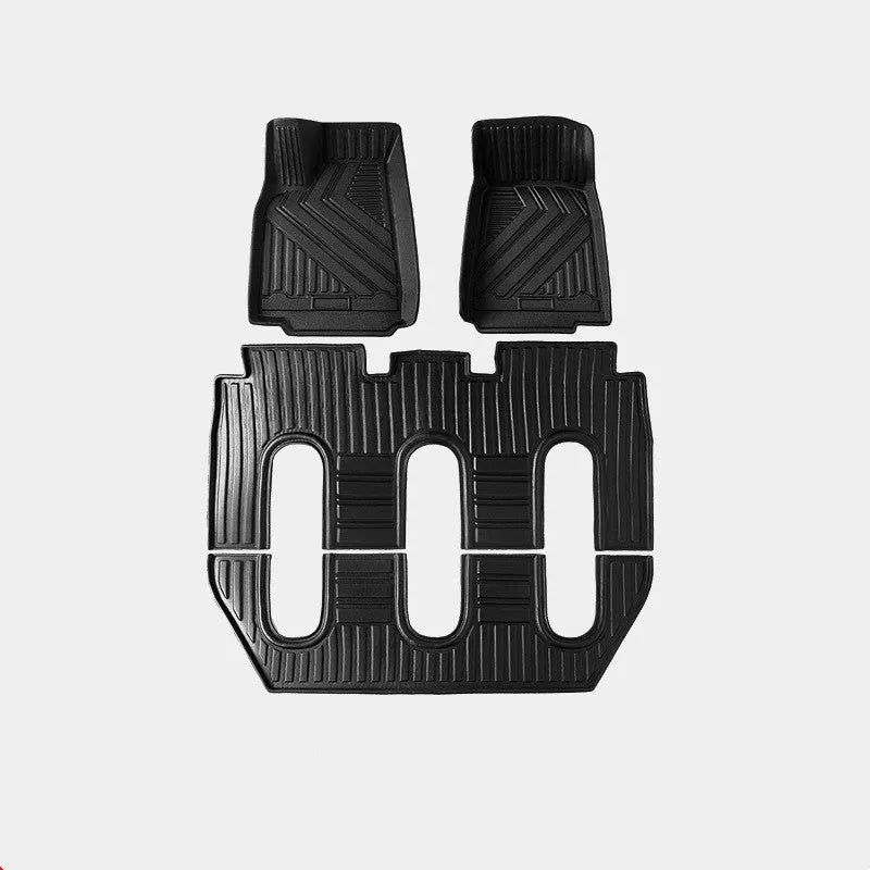 Tesla Model X waterproof TPE rubber floor mats showing left and right rudder design for vehicle-specific fitment