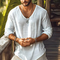 Beige long-sleeved slim-fit V-neck t-shirt made from a hemp blend fabric on a hanger.