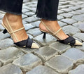 Apricot Black women's stiletto sandals with pointed toe and ankle buckle.