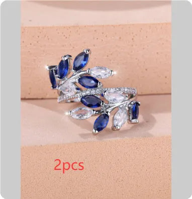 Adjustable copper leaf ring with horse eye design and zircon stones in multiple colour options