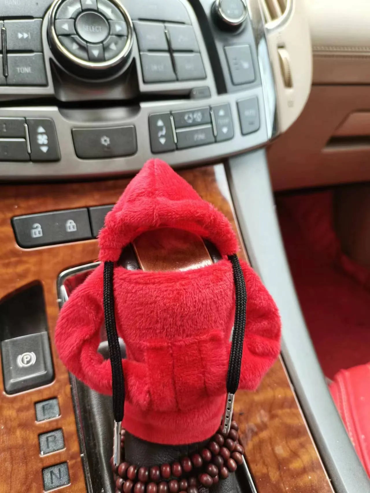 Dutch velvet car gear handle sleeve cover shown in various colours including black, red, blue, and pink.