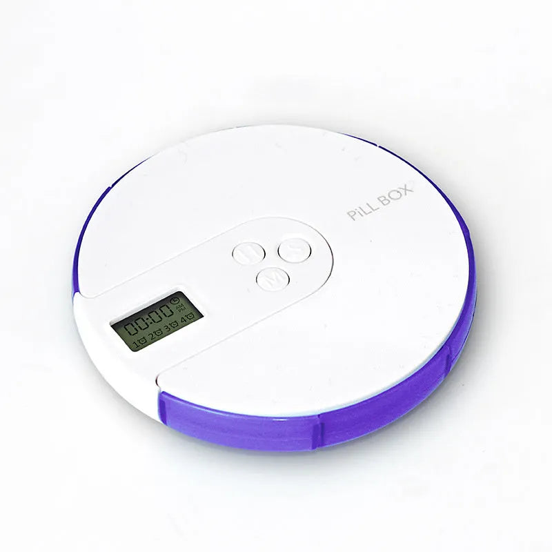 Blue seven-compartment alarm clock pill dispenser with digital display, shown next to pills.