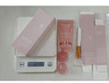 75ml bottle of collagen night face mask with an application brush on a white background.