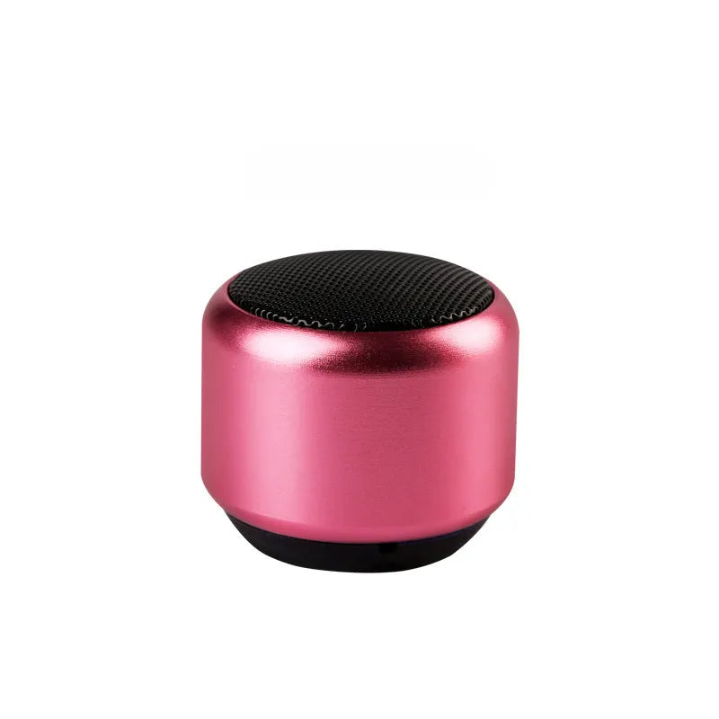 Small portable wireless Bluetooth speaker shown in black, blue, gold, and pink colour options.