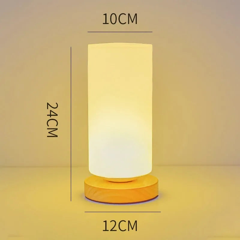 Nordic solid wood USB table lamp in cube style with touch dimming control on wooden desk