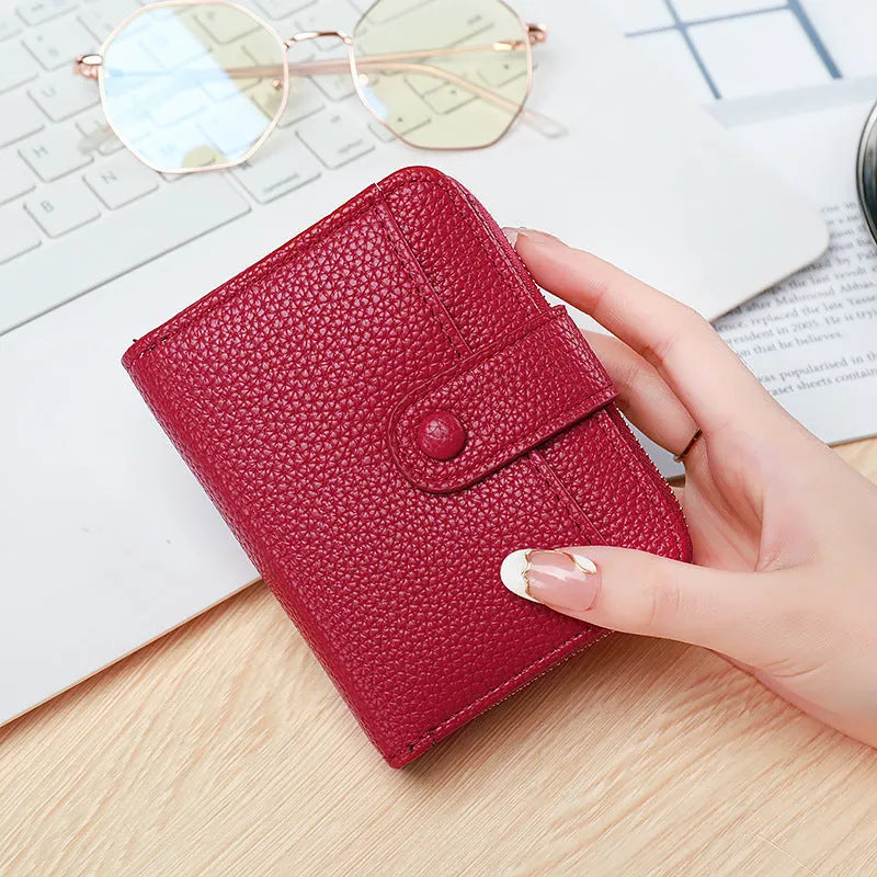 Ladies' short wallet with lychee pattern texture in 2-fold design, available in four colours