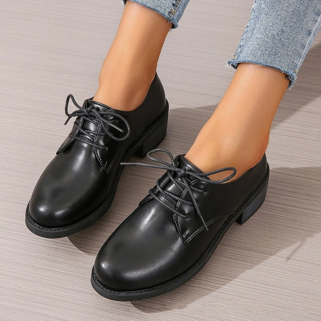 Black women's work shoes with thick chunky heel and professional PU leather upper
