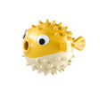 Yellow vinyl fish-shaped dog chew toy with textured surface for aggressive chewers.