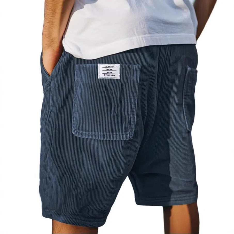 Men's gray corduroy shorts with multiple pockets and embroidery detail on straight-leg summer design