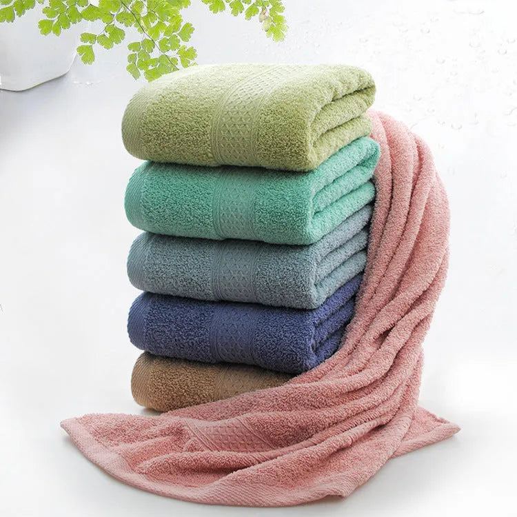 Thickened 800 gsm cotton bath and beach towel shown in apple green colour