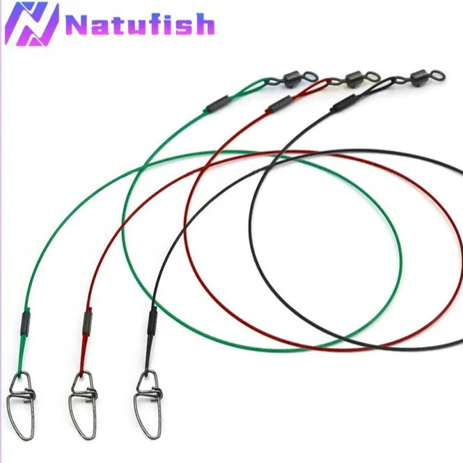 Ten green anti-bite steel wire fishing leaders with double buckle pins, each 54cm long, laid out straight.