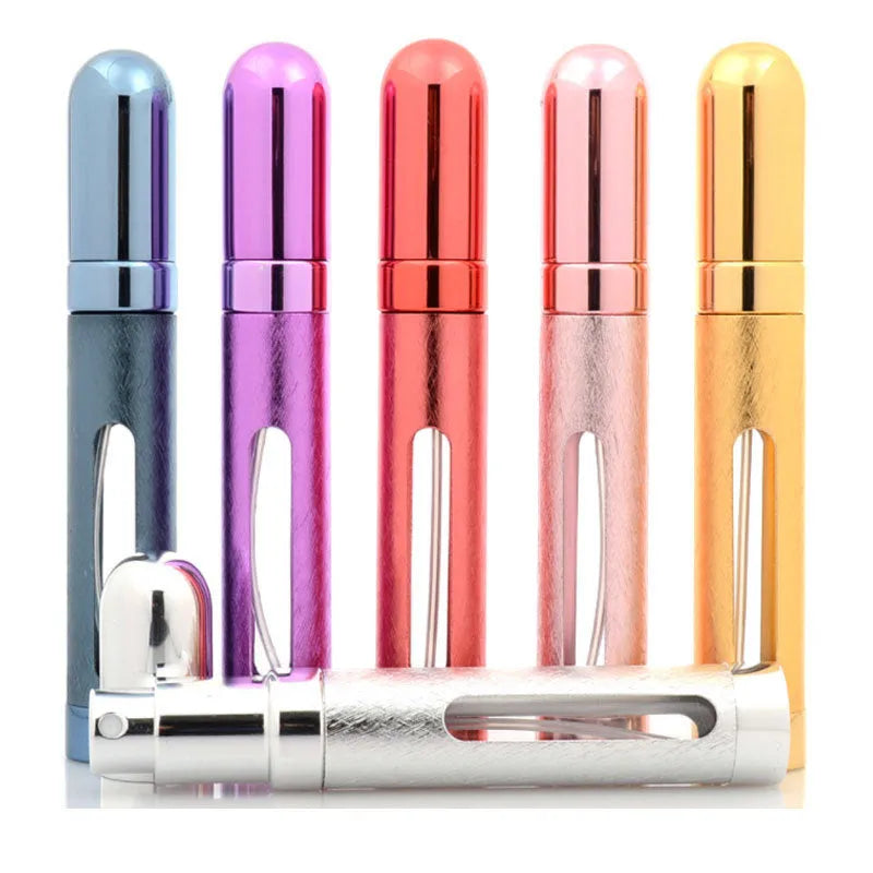 A slim, portable 12ml aluminium perfume bottle with a glass liner in choice of colours including blue, golden, pink, red, silvery, and violet.