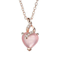 Women's heart-shaped pink crystal pendant with rose gold electroplated finish and matching cross chain