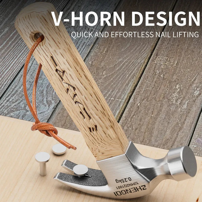 Mini claw hammer with wooden handle and high carbon steel head on a workbench