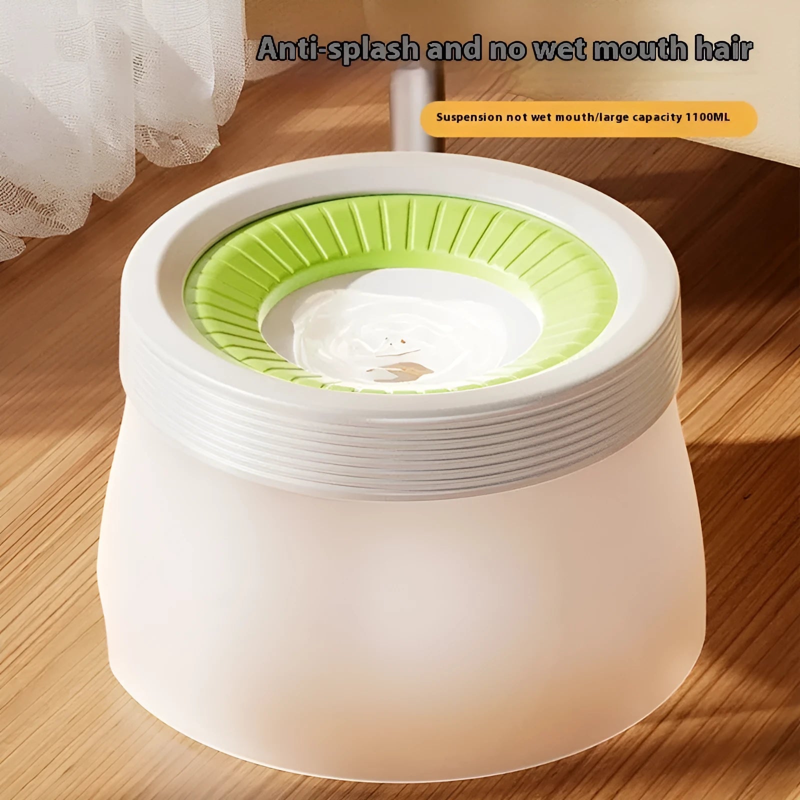 Green raised suspension water bowl for a dog on a white plate