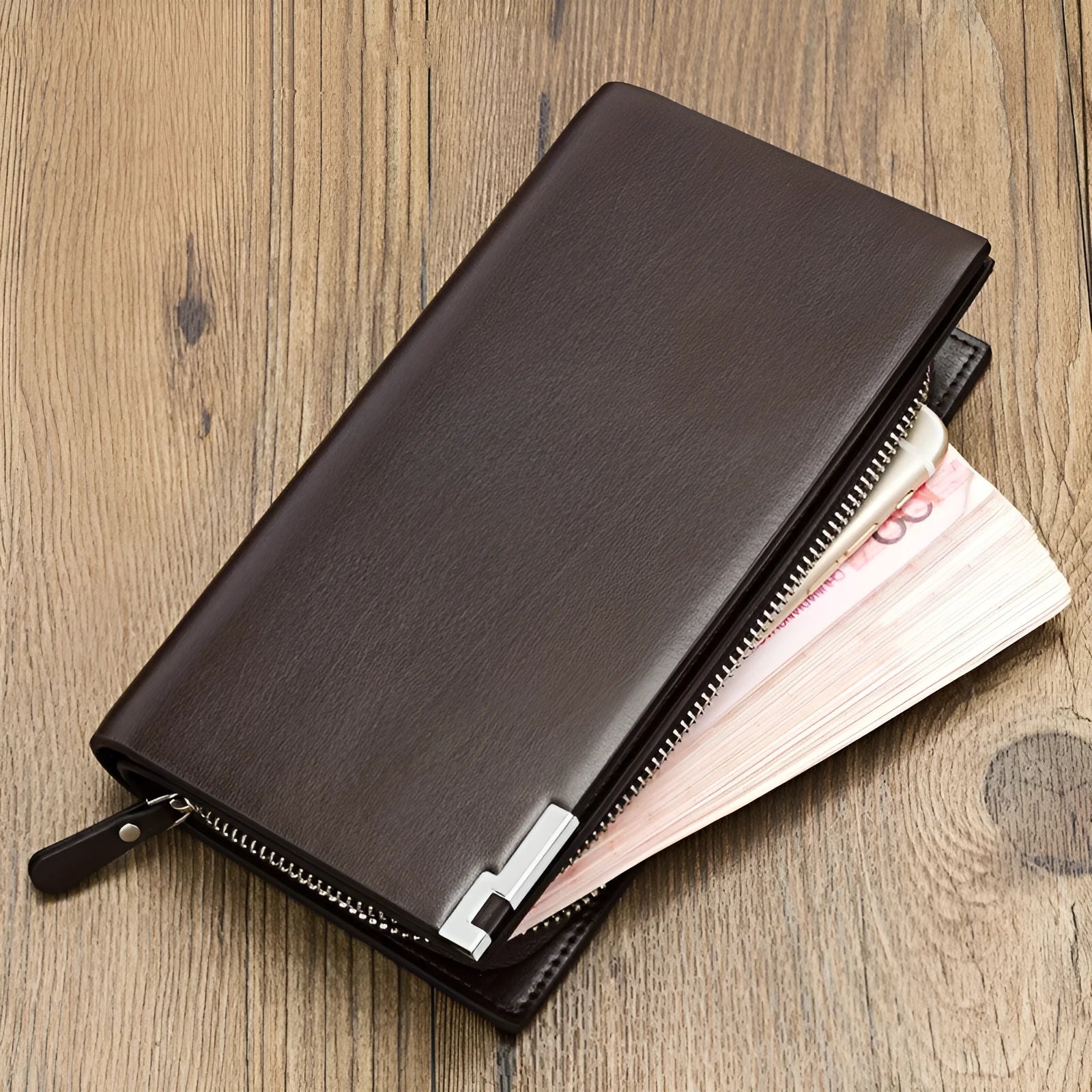 Men's black PU leather wallet with a long silver zipper closed around its edge.