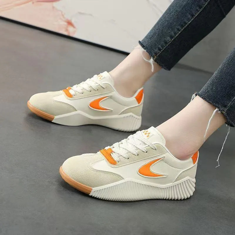 Soft leather casual sneaker in beige orange, low top flat heel round toe, with rubber sole