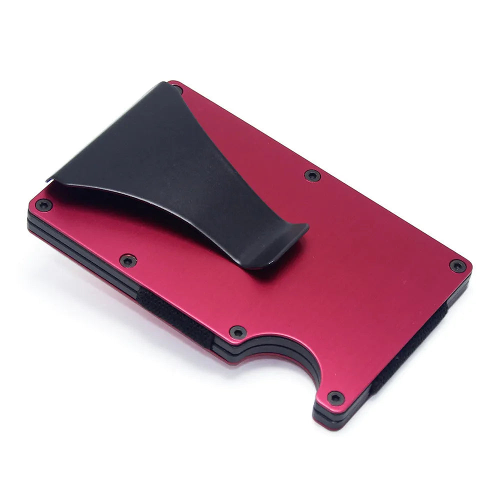 Geometric carbon fibre and aluminium slim card holder wallet in multiple colour options on a table.