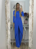 Casual black polyester two-piece lounge set with long sleeve top and loose trousers on a hanger.