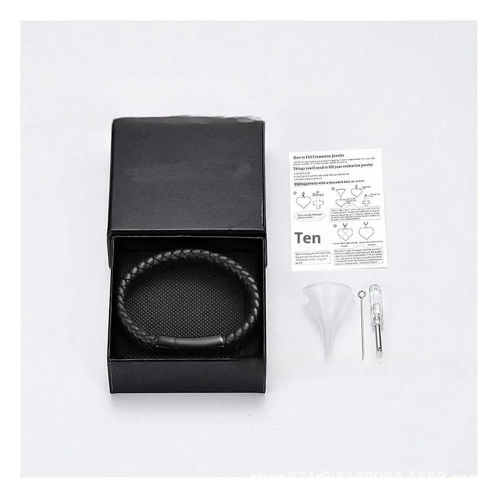Black woven stainless steel cinerary bracelet with personalised text in gift box
