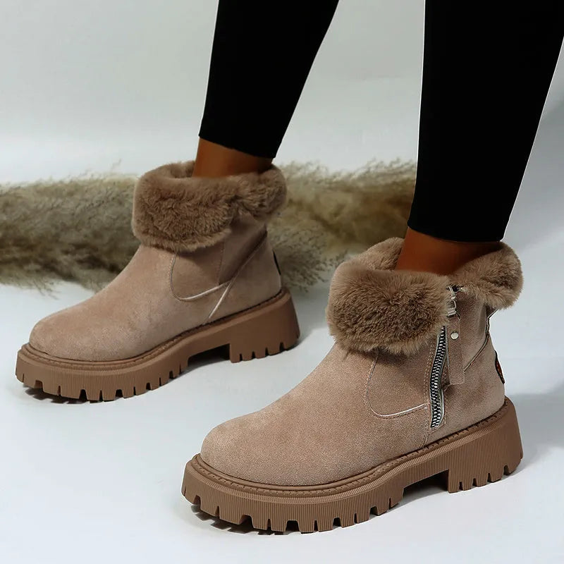 Women's black thick plush high top snow boots with side zipper and round toe on a rubber sole.