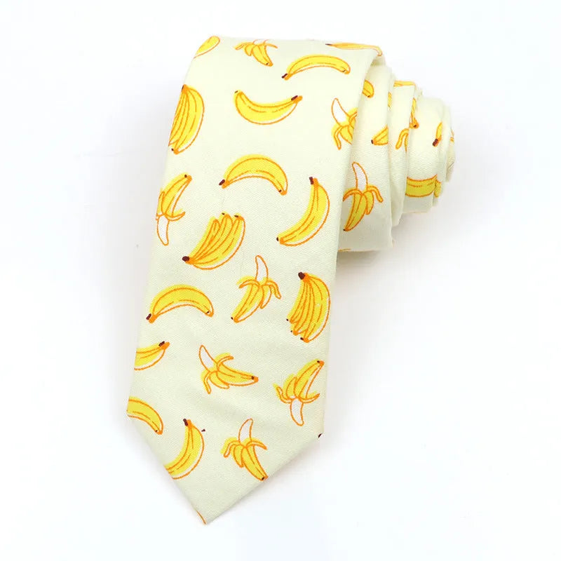 Men's narrow cotton bow tie in a cartoon print with an adjustable knot, shown in a selection of colours.