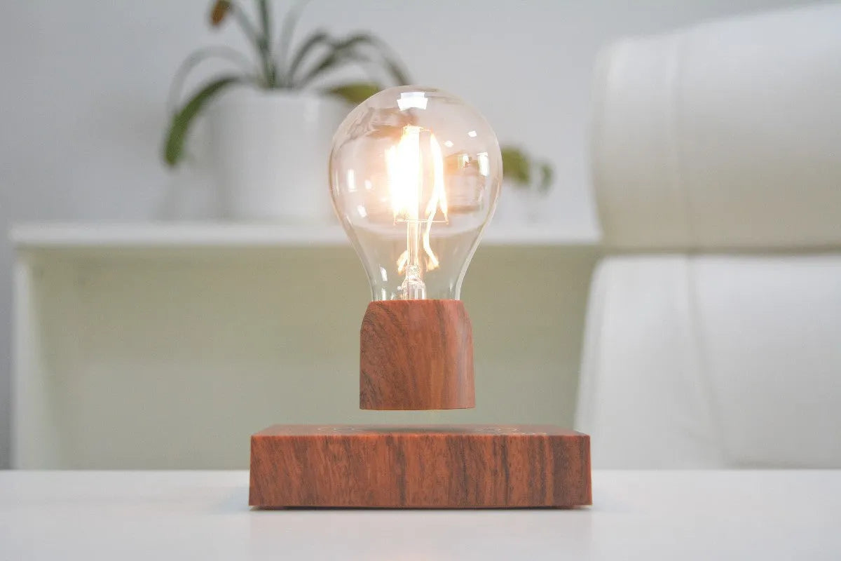 Magnetic levitation floating light bulb on imitation wood base