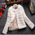 Women's short length faux fur top in white, black or beige with regular sleeves, 40cm length
